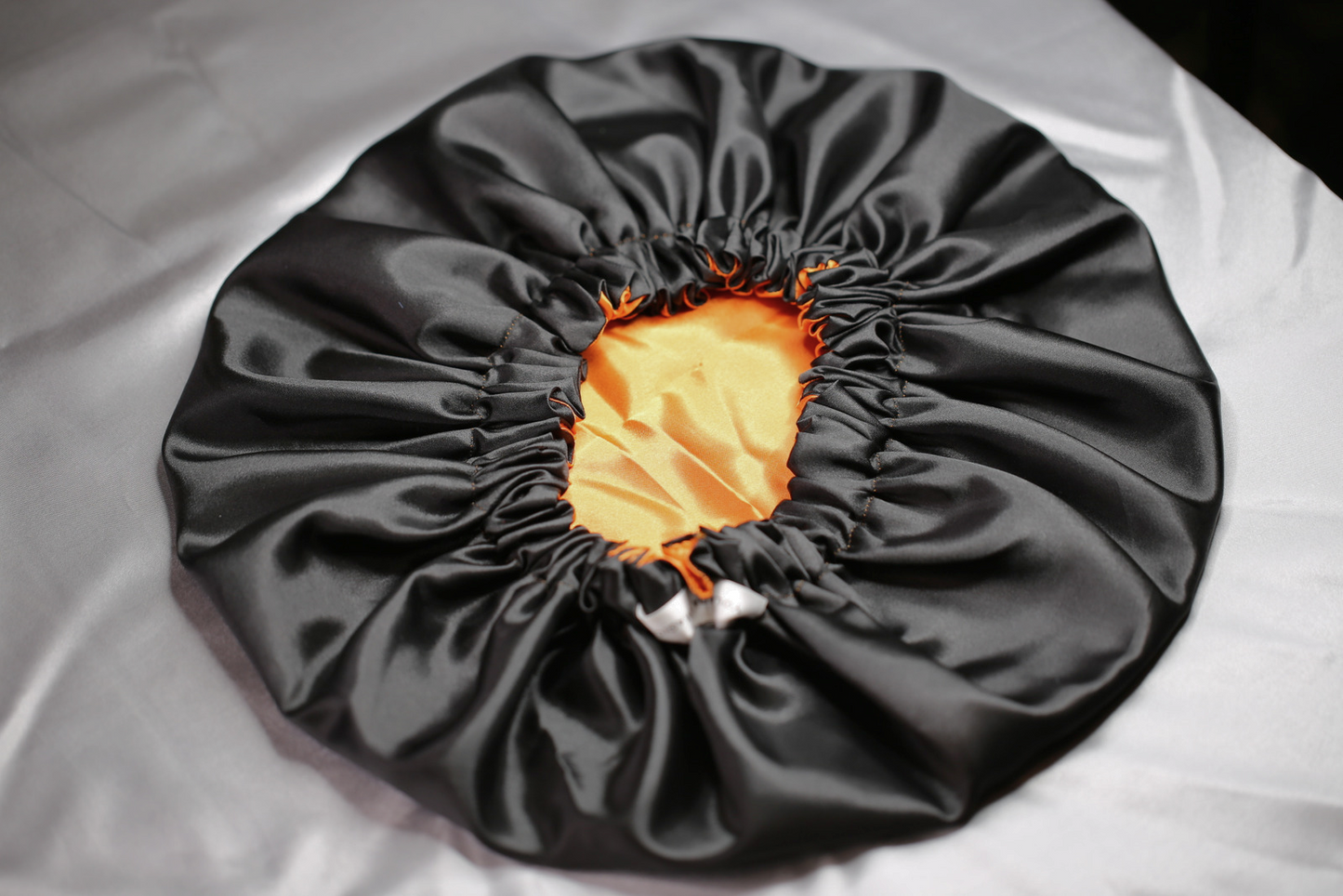 REVERSIBLE SATIN BONNET
